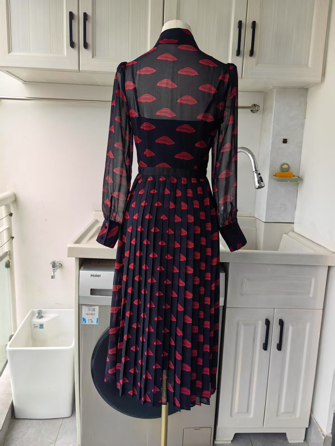 LKB Tallis Lips Print belted pleated midi dress