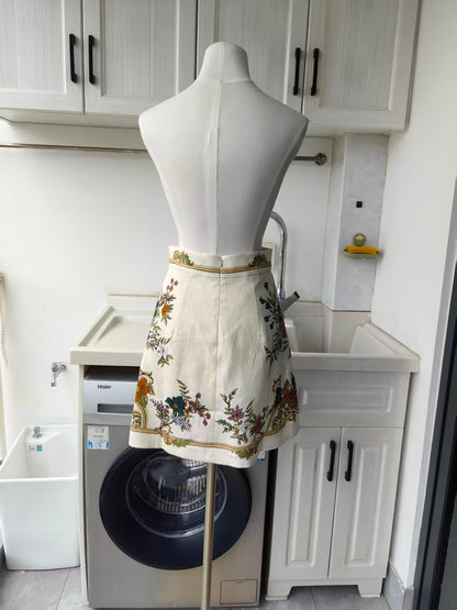 AM floral print viscose silk blouse and mini linen skirt