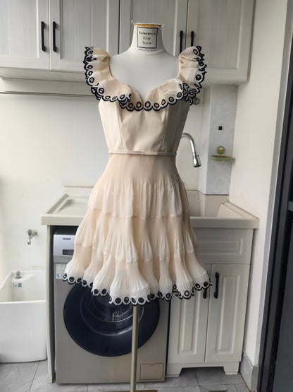 054Zm embroidered frilled mini dress